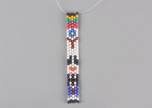 Five columns of seed beads, stitched together